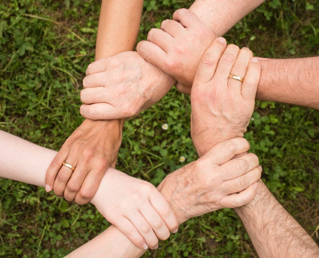 six holding hands community seminar
