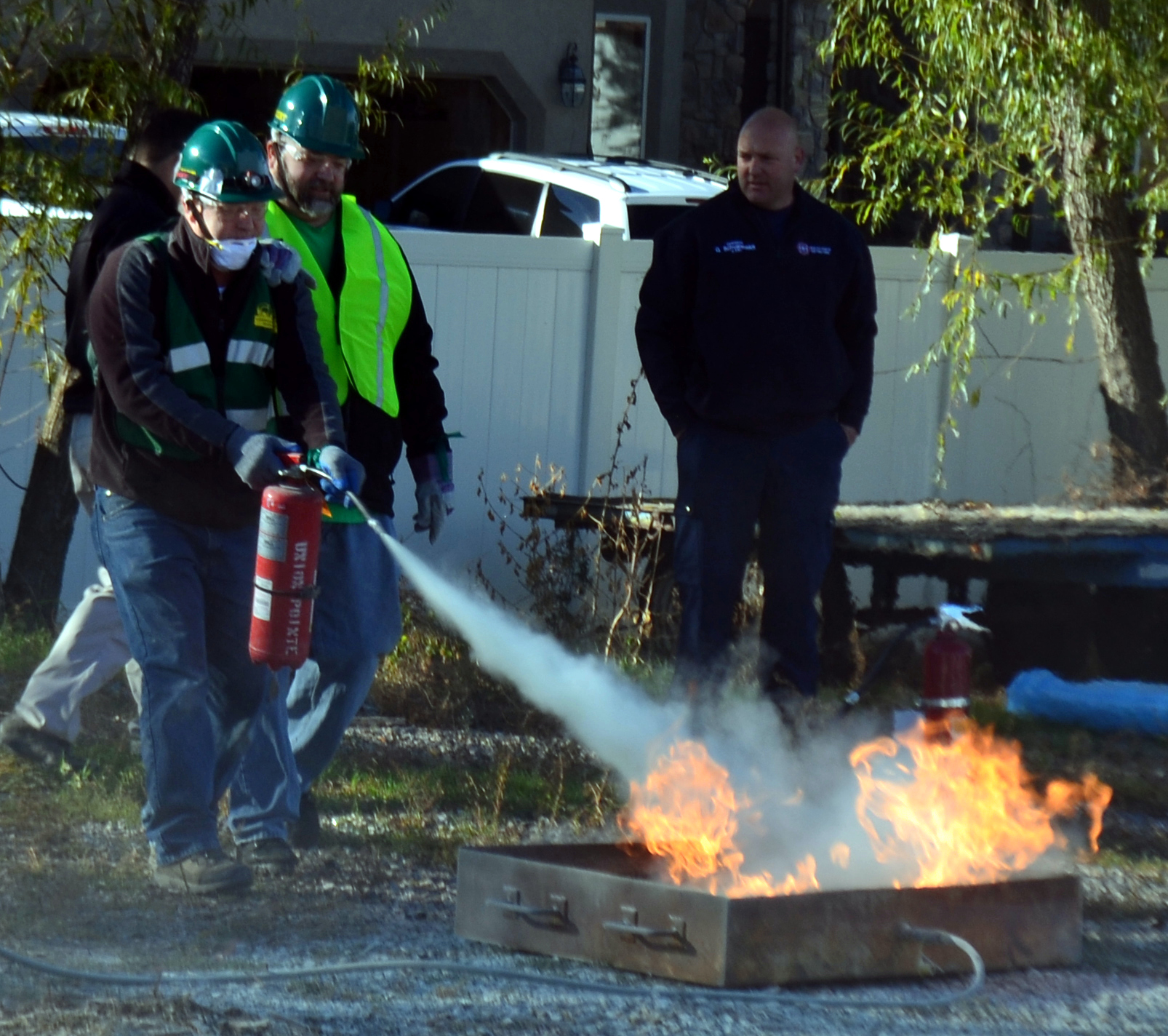 CERTs Practicing with a Fire Extinguisher